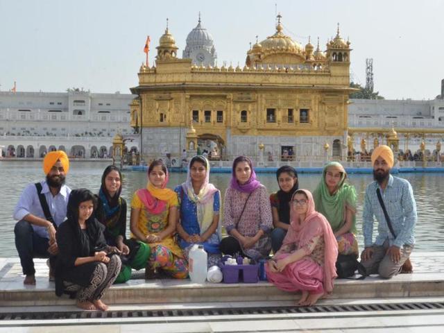 HOLY-WORK-The-team-of-restorers-and-artists-that-is-working-on-the-preservation-project-at-the-Golden-Temple-in-Amritsar