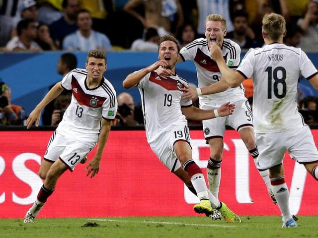 Germany's Mario Goetze (19) celebrates after scoring the opening goal during the Fifa World Cup final match between Germany and Argentina at the Maracana Stadium in Rio de Janeiro, Brazil. (AP Photo)