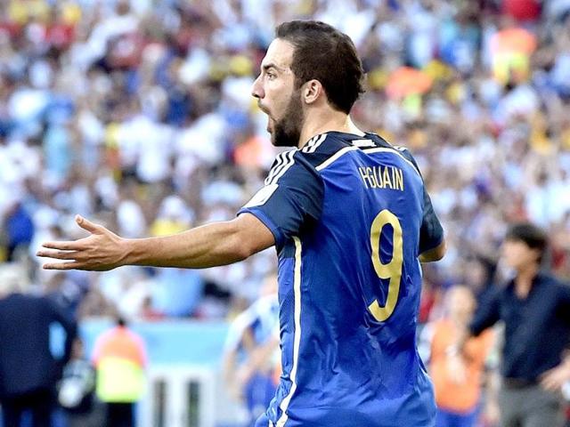 Argentina's Gonzalo Higuain reacts after the goal he scored was disallowed during the Fifa World Cup final match between Germany and Argentina at the Maracana Stadium in Rio de Janeiro, Brazil. (AP Photo)