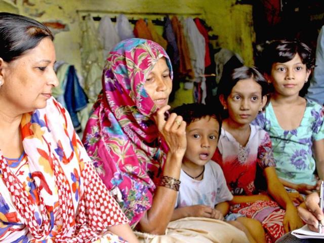 Meera-Deka-centre-with-her-three-children-two-from-her-first-husband-and-one-from-her-second-marriage-at-Baas-village-in-the-Narnaund-area-of-Hisar-district-on-Monday-Manoj-Dhaka-HT