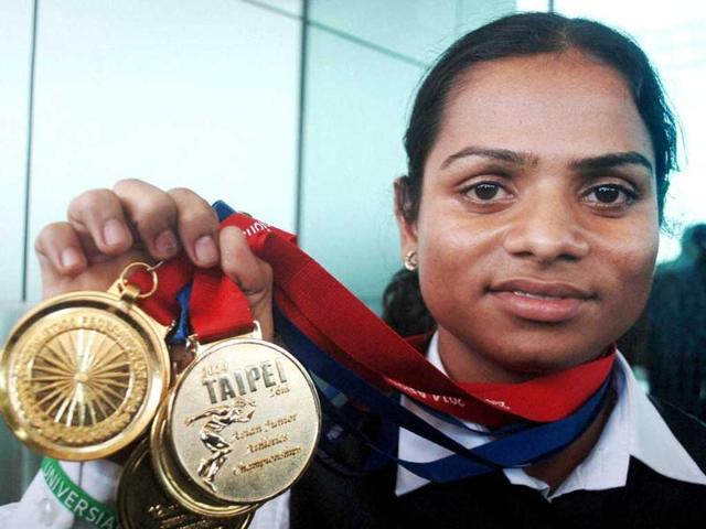 Odiya-athlete-Dutee-Chand-shows-her-medals-won-at-the-Asian-Junior-Atheletic-meet-in-Taipei-PTI-Photo Odiya-athlete-Dutee-Chand-shows-her-medals-won-at-the-Asian-Junior-Atheletic-meet-in-Taipei-PTI-Photo