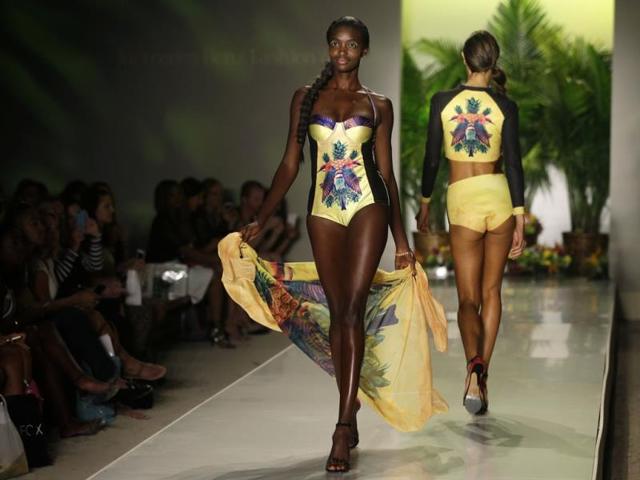 Models walk down the runway wearing swimwear designed by Wildfox. (AP Photo) 