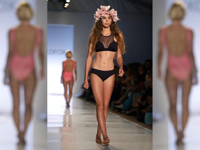 A model walks down the runway wearing swimwear designed by Wildfox. (AP Photo) 