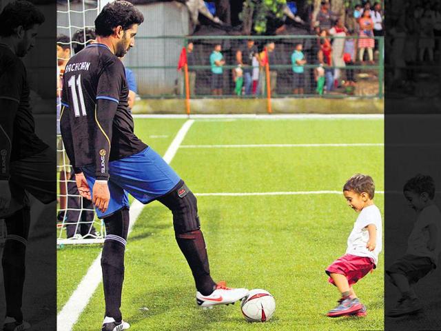 A charity football match was oraganised by Aamir Khan's daughter Ira khan. Celebrities from both TV and bollywood were seen in the charity match. Seen here, Abhishek Bachchan and Aamir's son Azad.
