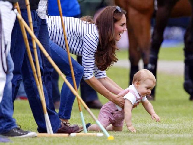 On his play-day out, Duchess of Cambridge and little prince watch papa William and uncle Harry play in the Jerudong Trophy charity polo match at Cirencester Park Polo Club on June 15. We wish we could just reach out into our screens and grab him and snuggle him and cuddle him ... (Getty Images) On his play-day out, Duchess of Cambridge and little prince watch papa William and uncle Harry play in the Jerudong Trophy charity polo match at Cirencester Park Polo Club on June 15. We wish we could just reach out into our screens and grab him and snuggle him and cuddle him ... (Getty Images)