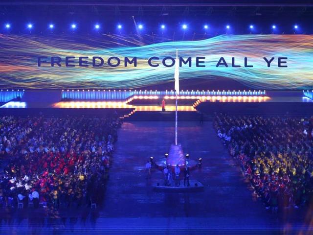 A message is displayed on a wall of video screen during the opening ceremony for the Commonwealth Games 2014 in Glasgow, Scotland (AP Photo)