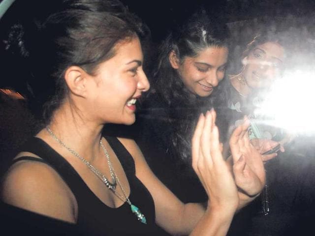 Jacqueline Fernandez, Rhea Kapoor and Sonam Kapoor arrive at the bash at Karan Johar's place. (Photos: Prodip Guha, Yogen Shah)