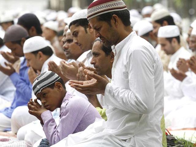 Muslims offer prayers as they celebrate the festival of Eid al-fitr, marking the end of Ramzan in Saharanpur. (Virendra Singh Gosain/HT photo)