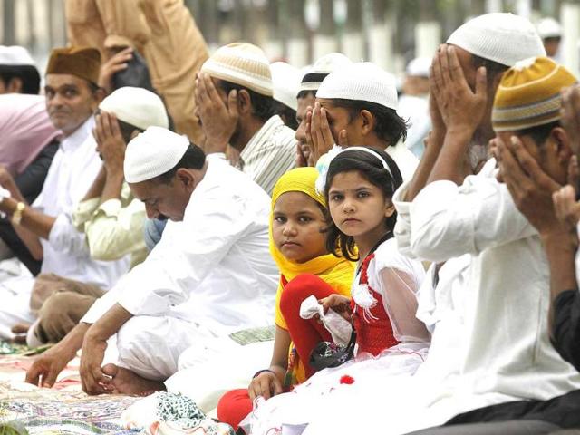 Muslims offer prayers as they celebrate the festival of Eid al-fitr, marking the end of Ramzan in Saharanpur. (Virendra Singh Gosain/HT photo)