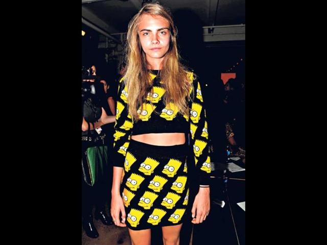 Go rebel chic in a crop top and skirt with bratty Bart Simpson prints.
