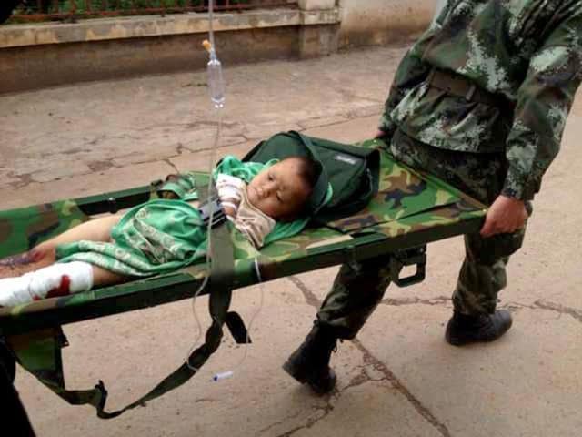 Rescuers-carry-an-injuried-child-on-a-stretcher-after-a-6-1-magnitude-earthquake-hit-the-area-in-Ludian-county-in-Zhaotong-southwest-China-s-Yunnan-province-AFP-photo Rescuers-carry-an-injuried-child-on-a-stretcher-after-a-6-1-magnitude-earthquake-hit-the-area-in-Ludian-county-in-Zhaotong-southwest-China-s-Yunnan-province-AFP-photo