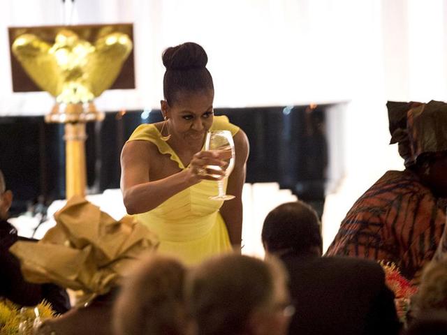 US-first-lady-Michelle-Obama-raises-her-glass-for-a-toast-during-a-dinner-for-participants-of-the-US-Africa-Leaders-Summit-AFP-Photo