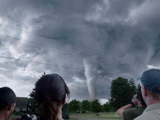 Into the Storm has a montage of characters, all caught in the disaster - a brother searching for his sibling, a widowed father trying to protect his son from the tornado...