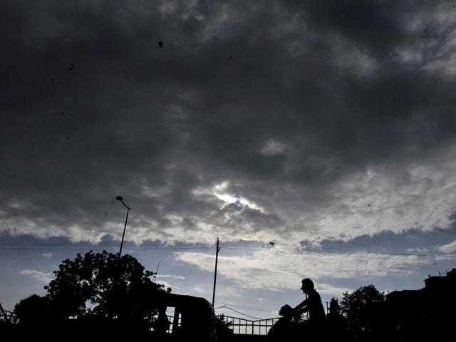 Dark clouds hover over Indore sky on Friday. (Amit K Jaiswal/HT photo)
