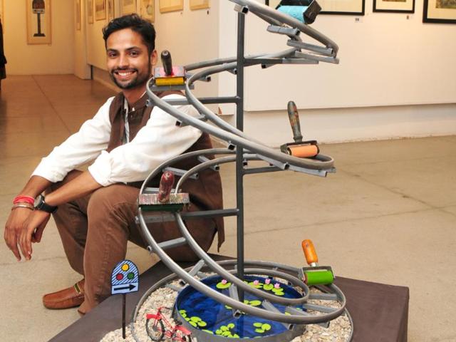 Artist-Rahul-Dhiman-with--his-art-work-display-in-sector-10-art-gallery-Chandigarh-on-Thursday--Ravi-Kumar-HT Artist-Rahul-Dhiman-with--his-art-work-display-in-sector-10-art-gallery-Chandigarh-on-Thursday--Ravi-Kumar-HT