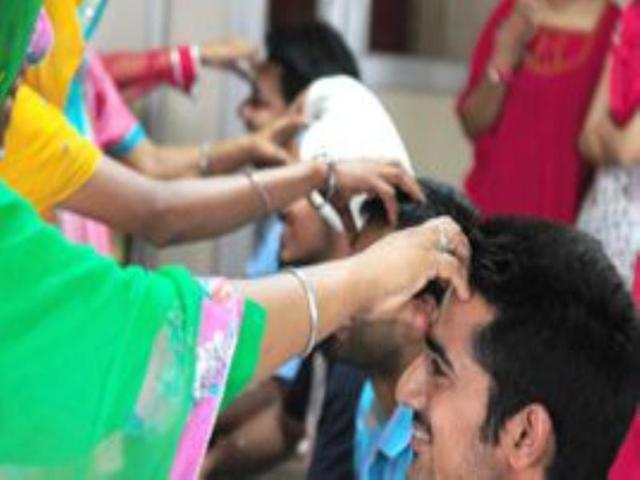 Center for social work students celebrated Rakhi with HIV positive women at Punjab university campus on Saturday.Ravi Kumar/HT