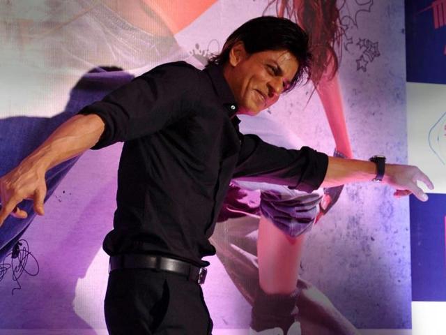 Shah Rukh Khan strikes a dancing pose at promotional event for Mad About Dance. (AFP Photo)