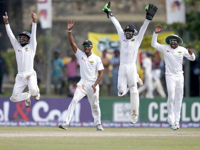 Sri Lanka's wicketkeeper Niroshan Dickwella (C), Mahela Jayawardene (2nd L), Kaushal Silva (L) and Kithuruwan Vithanage (2nd R) appeal for successful LBW wicket for Pakistan's Mohammad Talha (R) during the fifth and final day of their first test cricket match in Galle. (Reuters)