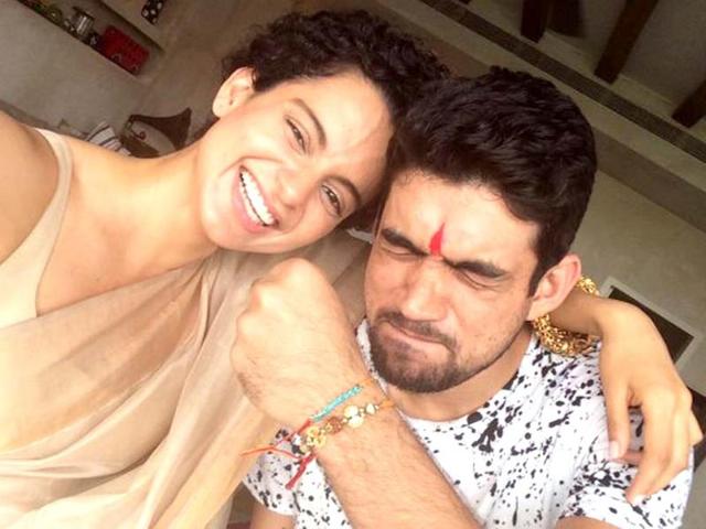 Kangana Ranaut updated her image with brother Akshit on her website. Kangana Ranaut updated her image with brother Akshit on her website.