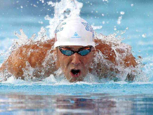 Michael Phelps swims the butterfly in the men's 200-meter individual medley final at the US nationals of swimming in Irvine, California. (AP Photo)