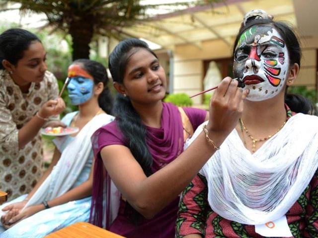 Nursing students participate in a face painting competition at Vijay Marie College of Nursing in Hyderabad on the occasion of upcoming Independence Day. AFP Photo