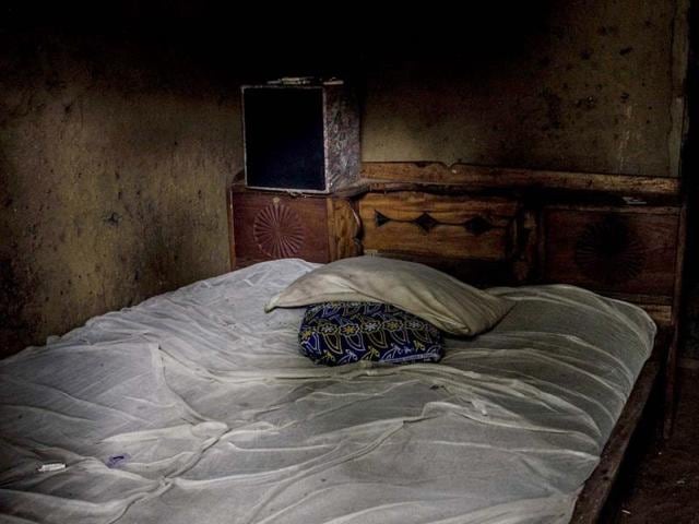 The unmade bed of Alhaji Abbah, who reportedly died of Ebola, in the village of Njala Giema, Sierra Leone. (AP Photo)