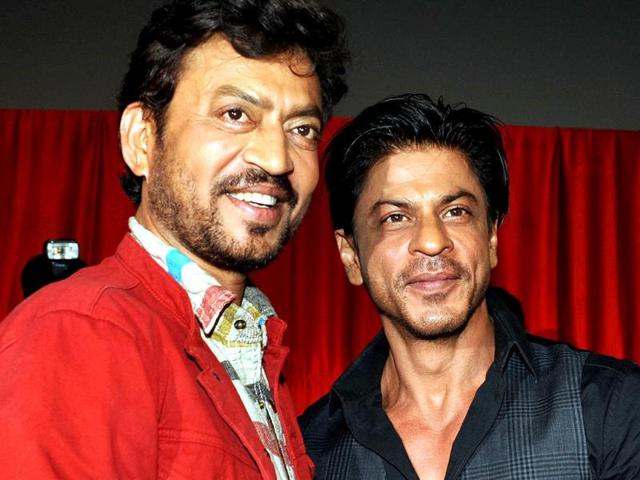 Irrfan Khan and Shah Rukh Khan are happy to strike a pose for the photographers. (AFP Photo)