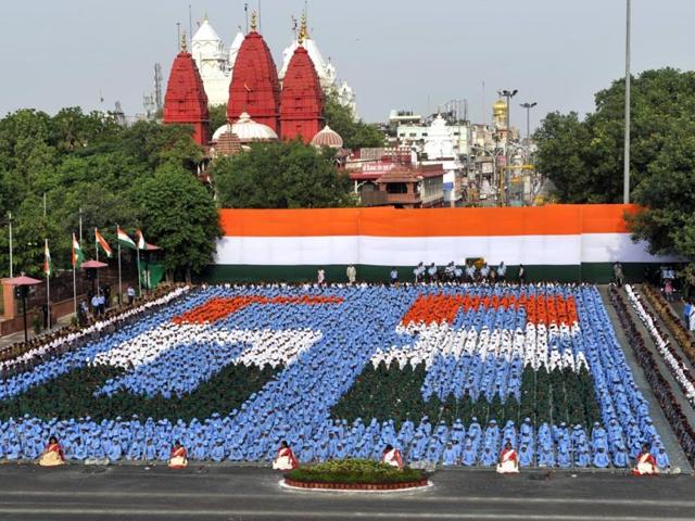 School children take part in the full dress rehearsal for the 68th Independence Day celebrations at the Red Fort in New Delhi. ( Photo By Hindustan Times)