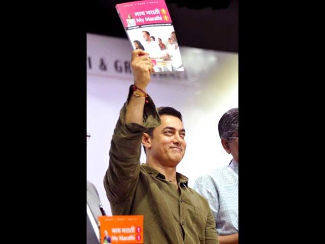 That's what it's all about, this book: Aamir Khan during the launch of Communicative Marathi, Level 1 book titled My Marathi. (AFP Photo)