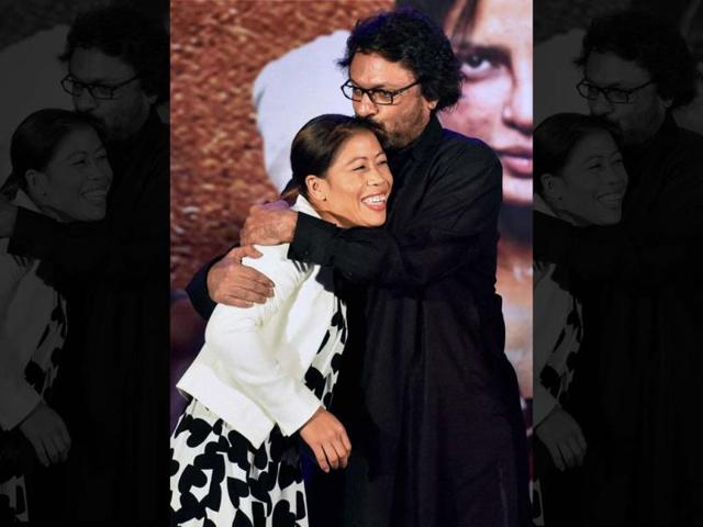 Producer Sanjay Leela Bhansali hugs boxing champion MC Mary Kom at the music launch of Mary Kom in Mumbai on Wednesday. (PTI Photo)