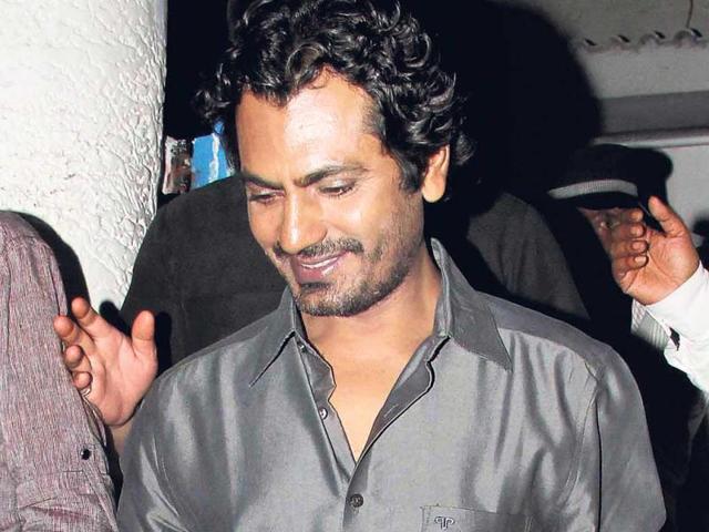 We also caught the shy Nawazuddin Siddiqui quietly sneaking away from the limelight. (Photos: Yogen Shah)