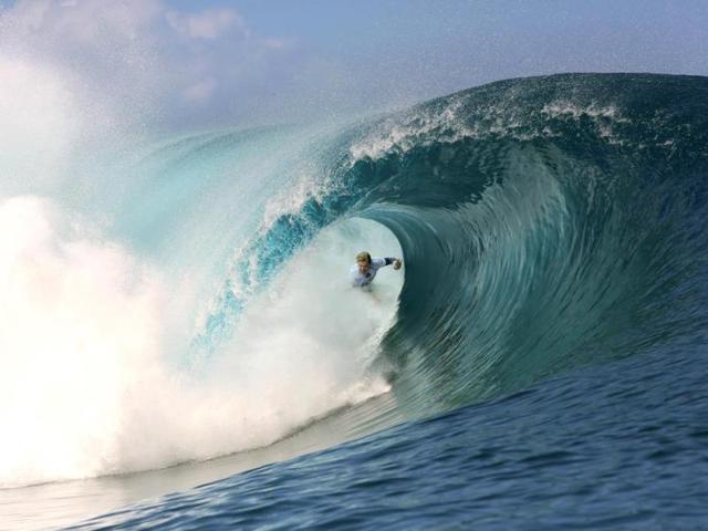 Australia's Adrian Buchan rides a wave during the 14th edition of the Billabong Pro Tahiti surf event, part of the ASP (Association of Surfing Professionals) world tour, in Teahupoo, on the French Polynesian island Tahiti. (AFP Photo)
