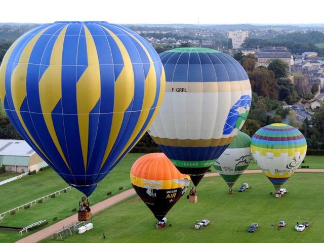 Hot air balloons take off during the 40th French Hot Air Balloon Championship. (AFP Photo)