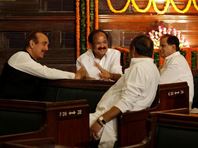 Congress leaders Ghulam Nabi Azad ,Anand Sharma, Ahmad Patel with BJP leader and Union minister for parliamentary affairs M Venkaiah Naidu after paying homage to former prime minister Rajiv Gandhi on his birth anniversary at Parliament House in New Delhi.(Arvind Yadav/ HT Photo)