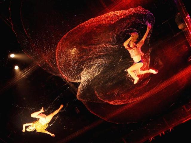 Artists performing during a show at China's national stadium in Beijing by Argentinian acrobatic theatre group Fuerza Bruta.(AFP Photo)