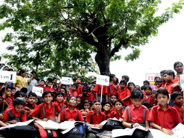 Students of Ojasdeep School were being evacuated from Model School building. A portion of school had been leased out but the lease expired. (Praveen Bajpai/HT photo)