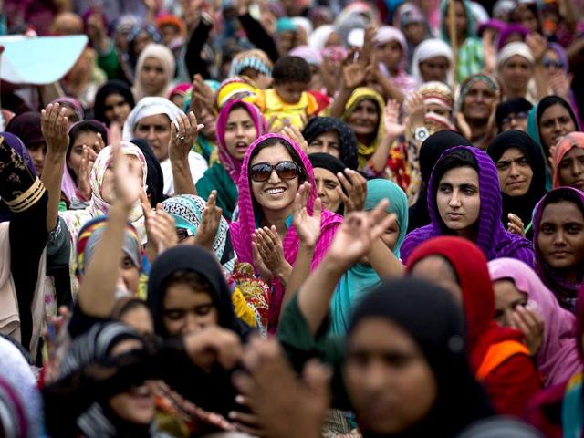 Supporters of Pakistan's cleric Tahir-ul-Qadri praise their leader's speech in Islamabad, Pakistan. (AP Photo)