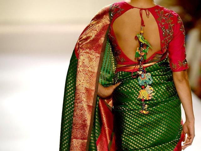 A model showcases a creation by designer Gaurang on the third day of the Lakme Fashion Week (LFW) Winter/Festival 2014 in Mumbai. (AFP Photo)