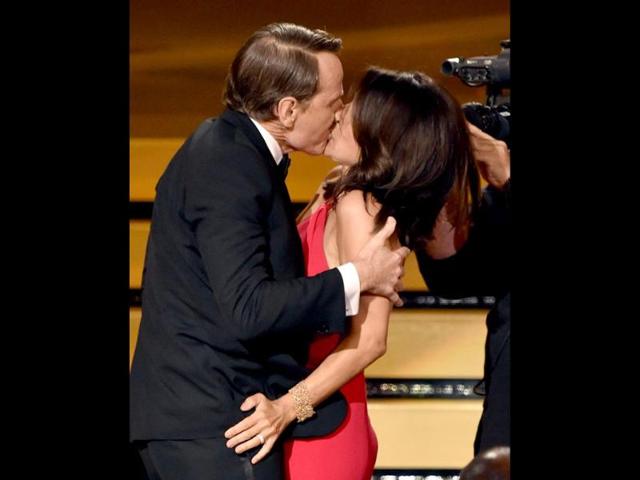 The best moment was when Bryan Cranston (very thoroughly) kissed Julia Louis-Dreyfous while she was walking towards the stage to accept her award.