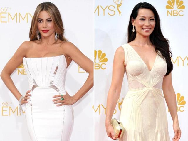 Paint me white: Modern Family actor Sofia Vergara and Charlie's Angels star Lucy Liu look classy in their white and off white gowns. (Reuters)