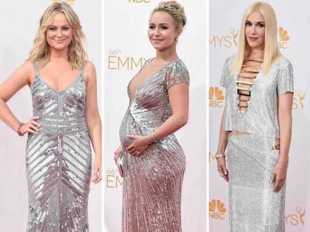 All that bling: Amy Poehler in Theia, pregnant Heroes actor Hayden Panettiere in Lorena Sarbu and singer Gwen Stefani pose on Emmys 2014 red carpet. (AFP)
