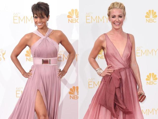 Halle Berry looked beautiful and ageless as always. Wearing a flowing mauve gown with a cinched waist, the 48-year-old actor looked absolutely phenomenal posing on the Emmys red carpet. TV host Cat Deeley too looked pretty in her pale pink gown. (AFP)