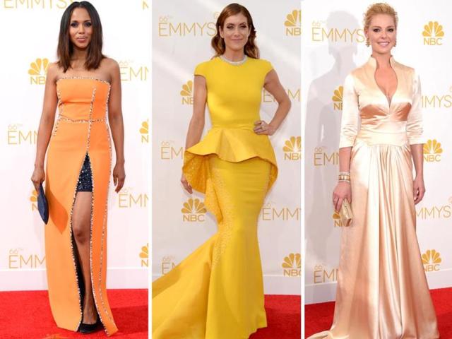 Kerry Washington somehow managed to make blue eye shadow look cool, not corny, while wearing an orange dress at the 2014 Emmy Awards! Katherine Heigl showed some cleavage in a plunging neckline and looked very old Hollywood, something we loved! But Kate Walsh had no such luck with her canary yellow dress; she looked like a ray of sunshine, yes, but that was about it. Sorry Kate! (AFP)