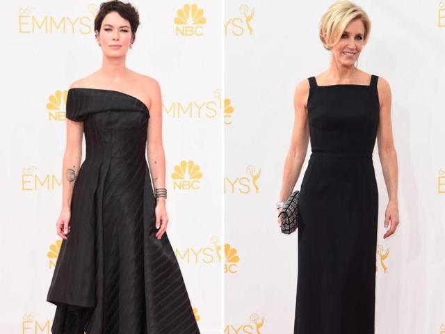 Queen Cersei reigns supreme! Game of Thrones actor Lena Headey stunned in a simple and sexy black dress at the Emmys. Desperate Housewives star Felicity Huffman too went the black route, sporting a sleek black column gown and studded clutch. (AP)