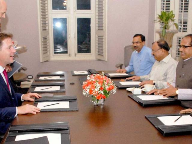 Britain's Deputy Prime Minister Nick Clegg at a meeting with Madhya Pradesh chief minister Shivraj Singh Chouhan in Bengaluru on Wednesday. (PTI photo)