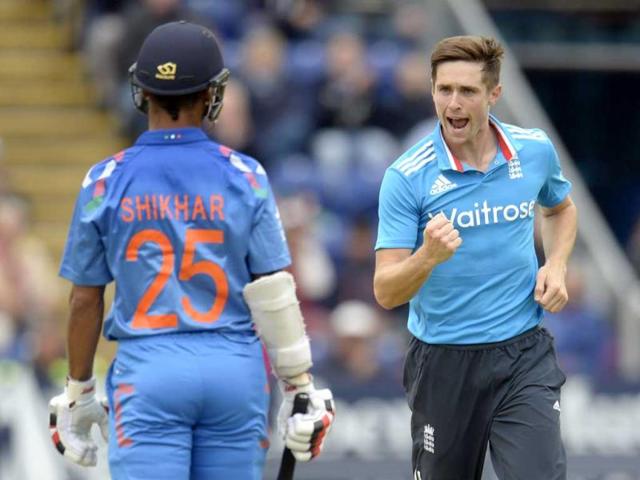 Chris Woakes (R) celebrates after dismissing Shikhar Dhawan during the second ODI match between England and India in Cardiff, Wales. (Reuters Photo)