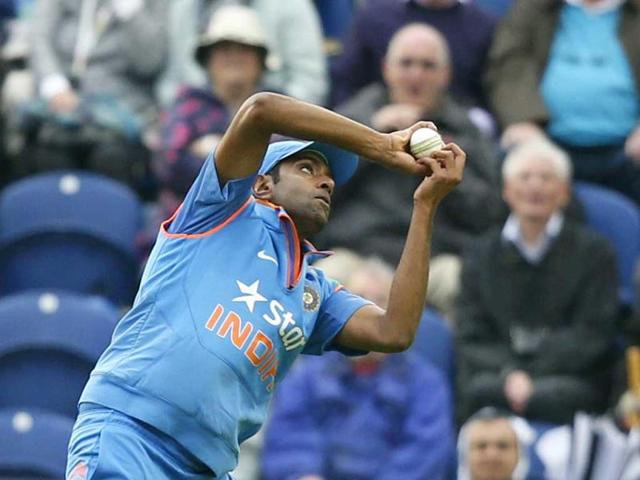 Ravichandran Ashwin takes a catch to dismiss Alex Hales off the bowling of Ravindra Jadeja during the second ODI match between England and India in Cardiff, Wales. (AP Photo)