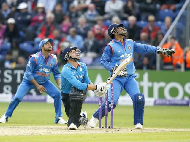 Alex Hales looks up after miss-hitting a ball from Ravindra Jadeja that was caught by Ravichandran Ashwin during the second ODI match between England and India in Cardiff, Wales. (AP Photo)