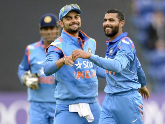 Virat Kohli congratulates teammate Ravindra Jadeja (R) after the dismissal of Ben Stokes (not pictured) during the second ODI match between England and India in Cardiff, Wales. (Reuters Photo)