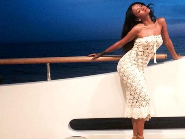 After the end of her Monster tour with Eminem, Rihanna took a beachside vacation and offered us a view via Twitter. Here's looking at how Rihanna lets her hair down. (Twitter)